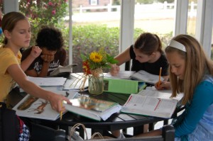Middle School Montessori Students Engaged In Research
