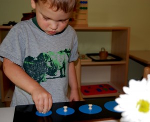 Toddler Student Practices Fine Motor Skills